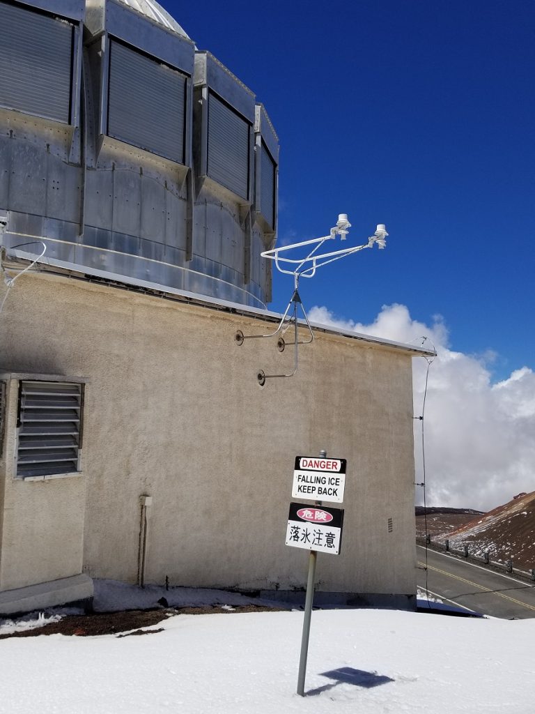 Ice and snow fell from observatories as the warm Hawaii sun hit, creating a hazard below. Photograph: Weatherboy