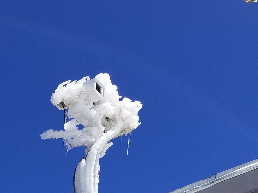 Snow and ice encase a camera/sensor outside an Observatory on the summit of Mauna Kea, Hawaii. Photograph: Weatherboy