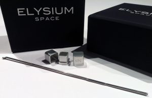 After someone books a celestial memorial services, they receive this kit containing a custom ash capsule to collect a cremated remains sample. The kit includes a mini-scoop to easily transfer a symbolic portion of the remains from a cremation urn to the capsule. The kit includes a shipping box with a pre-addressed/pre-paid label for US customers and shipping instructions for international customers. The capsule is individually prepared to have the initials of choice, up to 3 characters, engraved on its cap. Photograph: Elysium Space