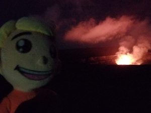 A plume of smoke glows red as the Kīlauea Volcano continues to erupt at its summit in Halemaʻumaʻu Crater. May 2017 Photograph: Weatherboy