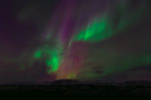 Aurora, also known in the Northern Hemisphere as "Northern Lights", is typically associated with clear, cold winter nights at northern latitudes.