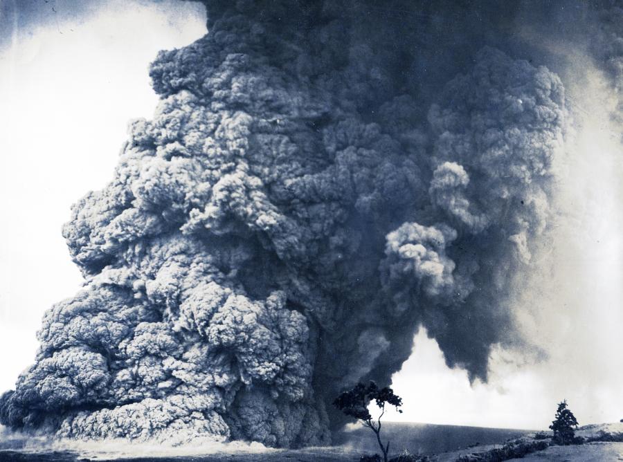 Explosive eruption column from Halema‘uma‘u Crater 11:15 a.m. May 18, 1924 - one of many in a series of similar events during May 11-27. Photo from northwest rim of Kīlauea summit, present site of HVO. Image: USGS/Maehara K.
