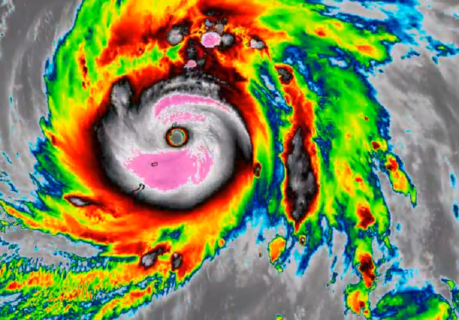 This satellite image shows the point the western eye wall of Super Typhoon Yutu struck both Sapian and Tinian. Image: NOAA