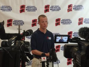 Dr. Phil Klotzbach addresses the media at the 2018 National Tropical Weather Conference. Image: NTWC