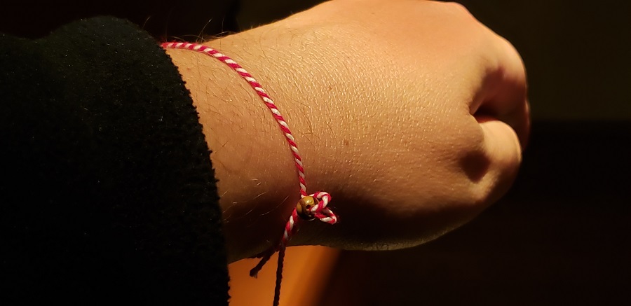 A Weatherboy team meteorologist wears a special bracelet gifted by another attendee of the European Space Agency's Aurora Hunters endeavor. Image: Weatherboy