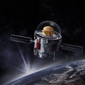 An artist's illustration of the KFC Zinger in space. Photo: KFC