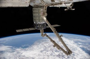 Cygnus cargo craft attached to the end of the Canadarm2 robotic arm and is berthed to the nadir port of the Harmony Node of the International Space Station. Image: NASA
