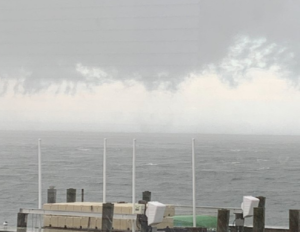 A tornado began as a waterspout over Barnegat Bay, moved onshore briefly as a tornado, and then back offshore as a waterspout. Image: Gina Weppler & National Weather Service